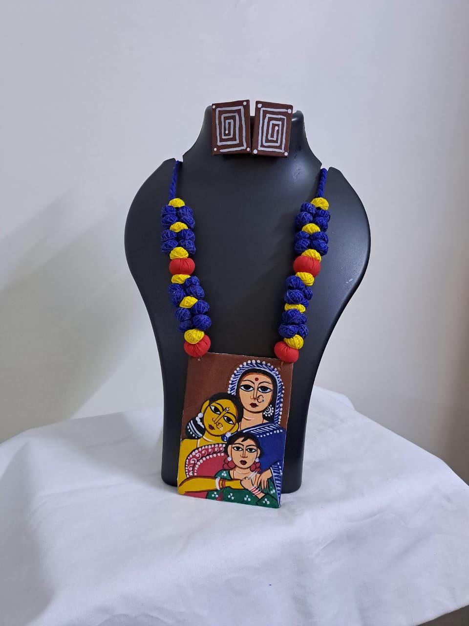 Handpainted fabric jewellery set with matching earrings