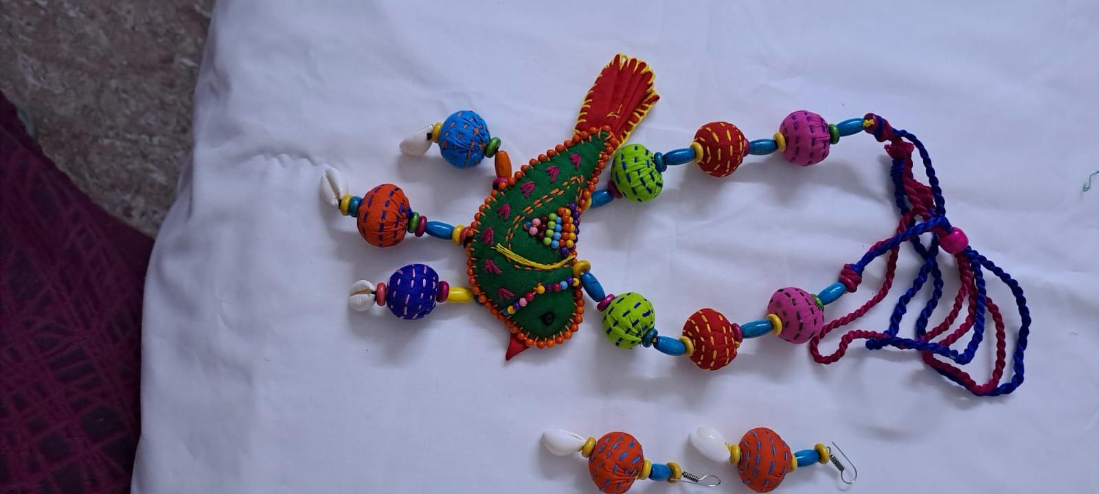 Exclusive fabric necklace with embroidered green fabric bird pendant and fabric beads n matching beads