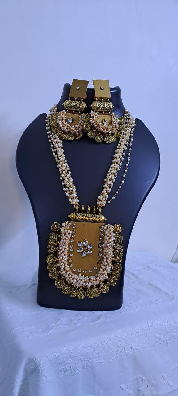 Exclusive Indian traditional golden fabric necklace with laural beads and kundan n matching earrings