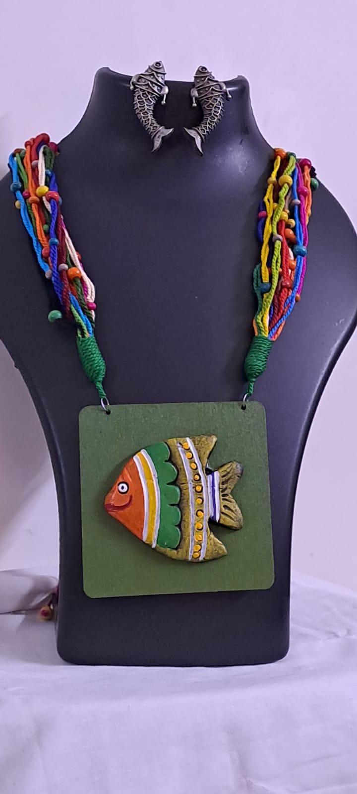 Terracotta fish pendant and thread necklace