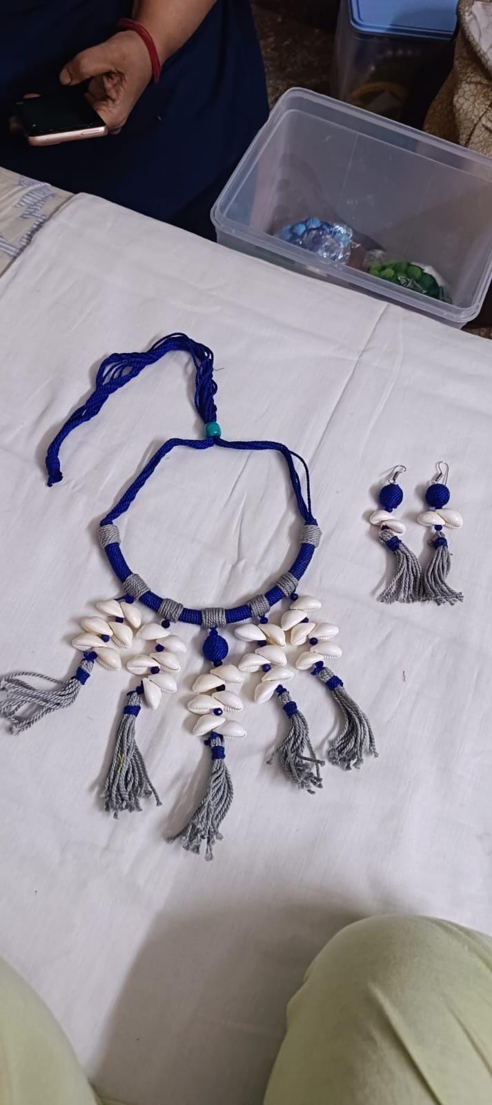 Exclusive blue n grey hasuli thread necklace set with shell fringes n matching earrings
