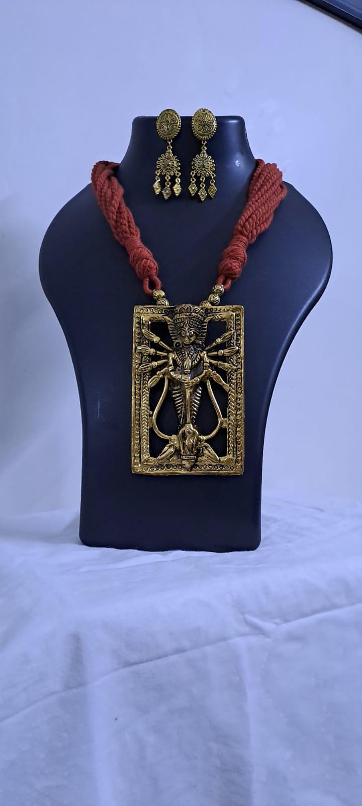 Brown  thread necklace with oxidised golden durga pendant