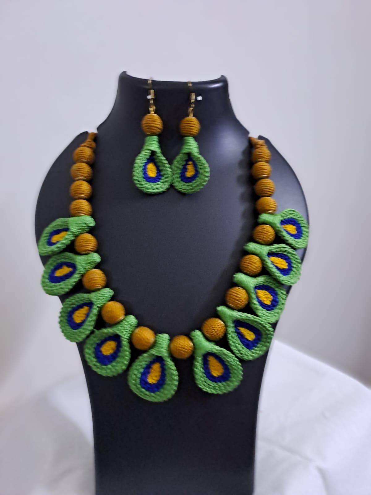 Green n yellow thread necklace with matching thread earrings.