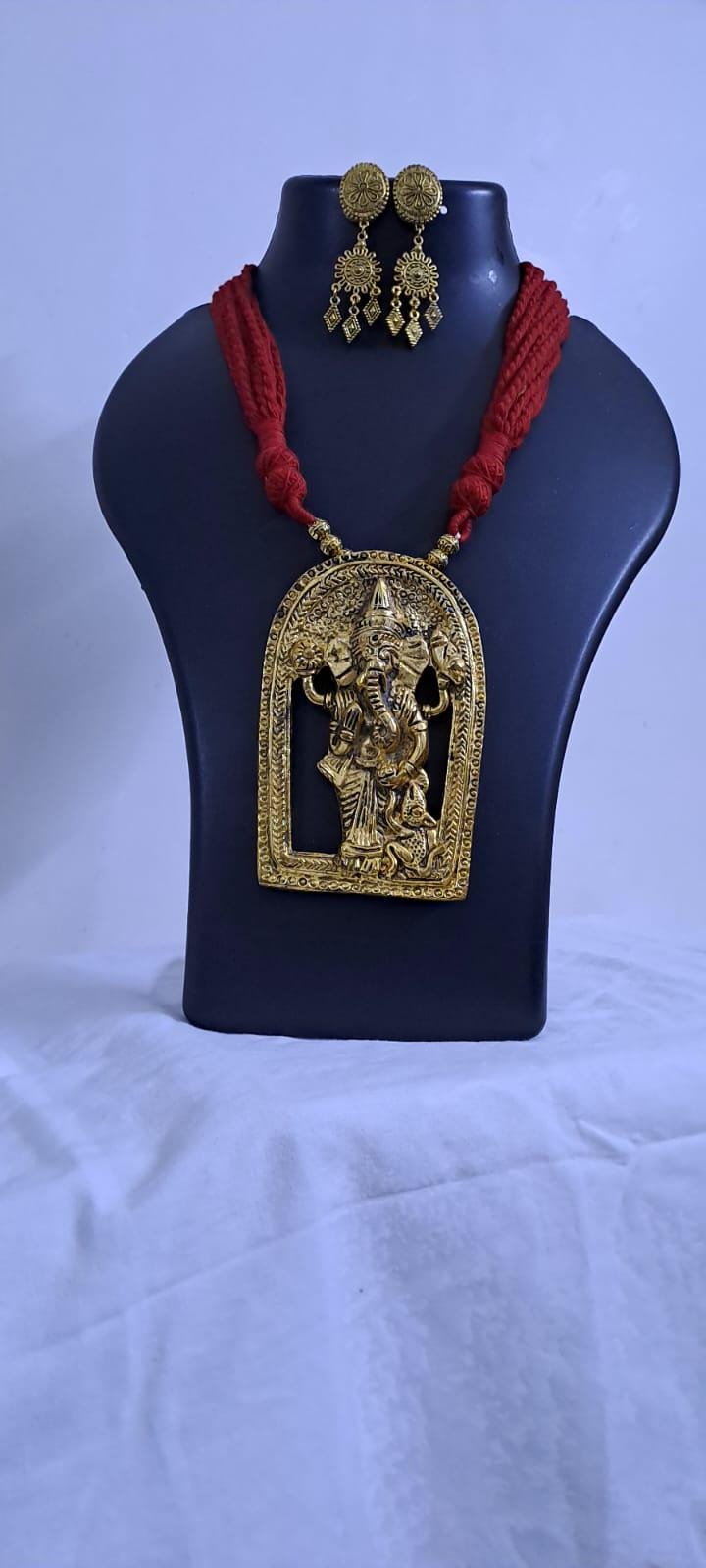 Maroon thread necklace with golden oxidised ganesha pendant