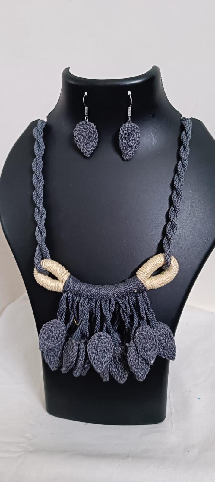 Grey Crochet thread necklace set with leaf fringes and matching earrings