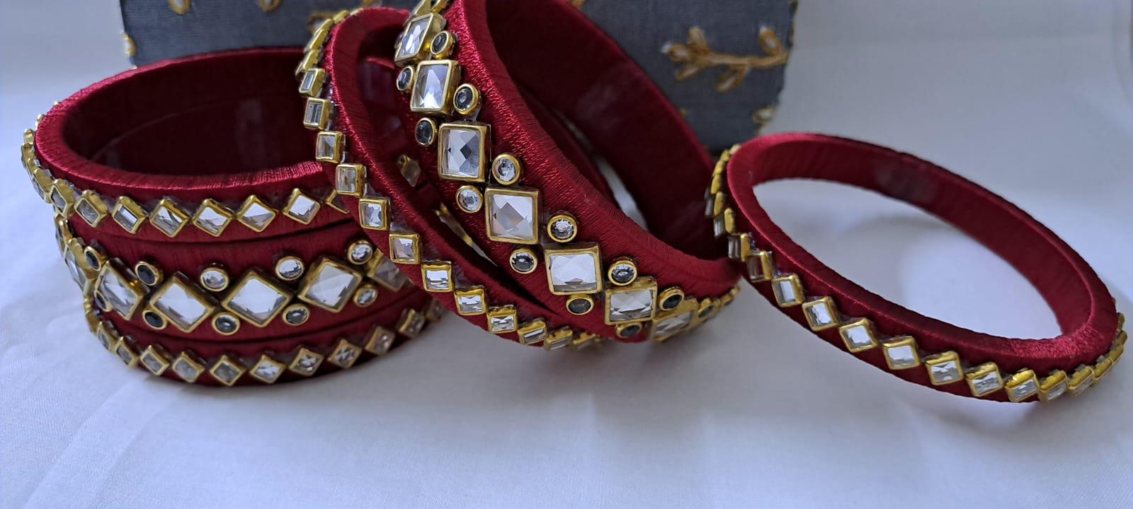Maroon colour traditional thread kundan bangles with zari bangle box