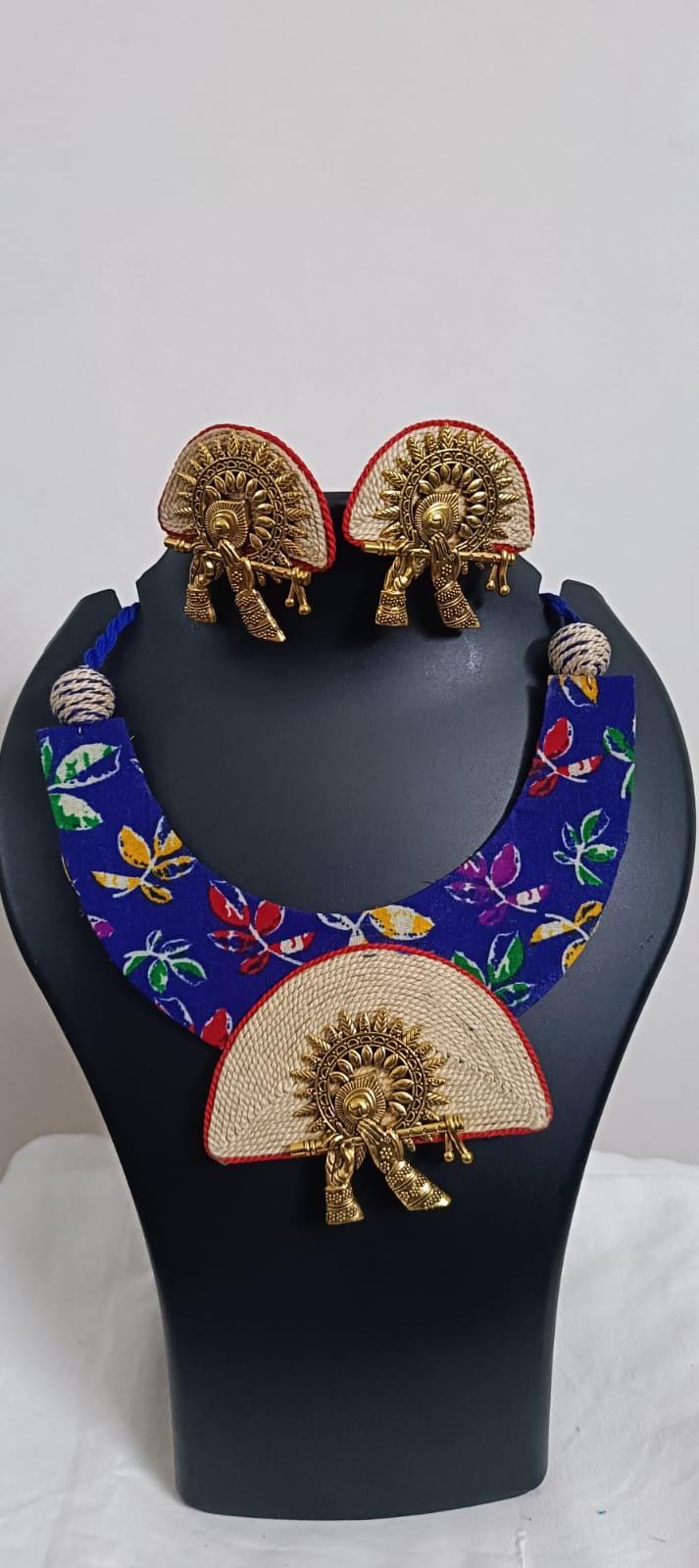 Unique fabric n thread necklace set with golden oxidised pendant and matching earrings