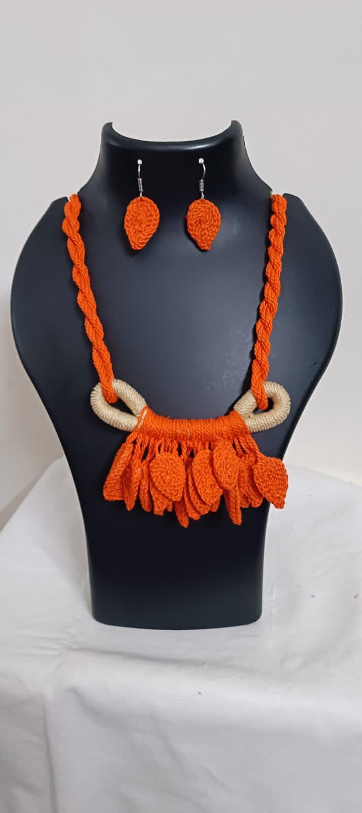 Orange Crochet thread necklace set with leaf fringes and matching earrings