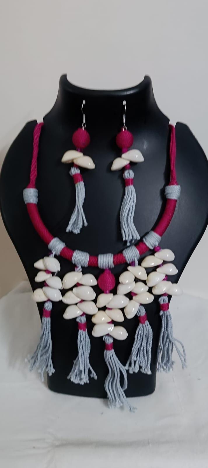 Exclusive pink n grey hasuli thread necklace set with shell fringes n matching earrings