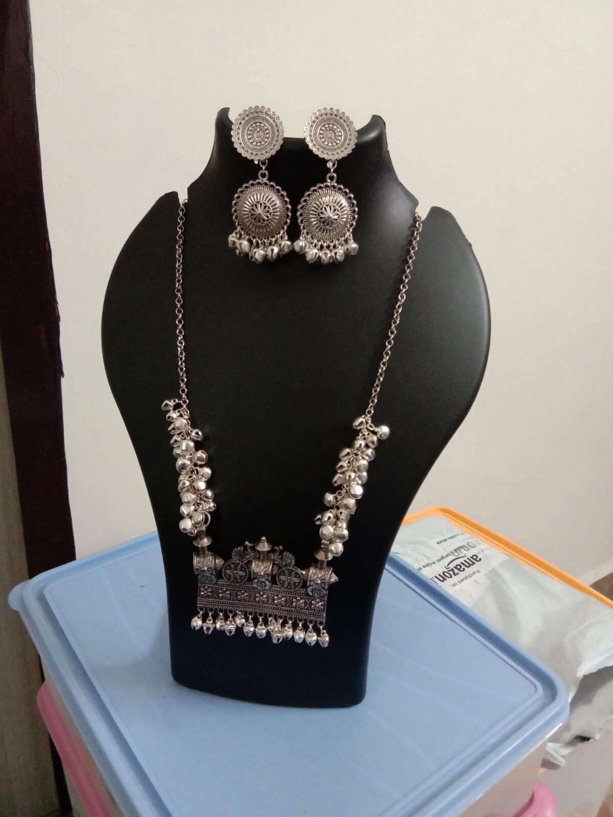 Oxidised silver chain with traditional pendant and matching earrings.