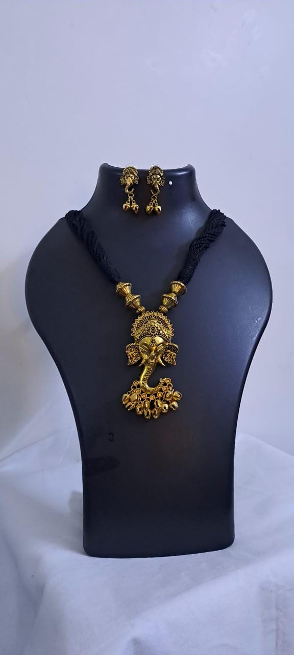 Black thread necklace with Golden oxidised traditional pendant