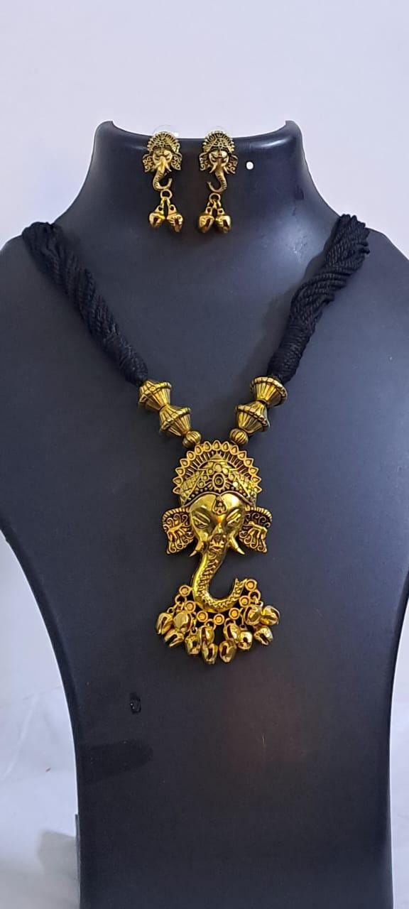 Black thread necklace with Golden oxidised traditional pendant