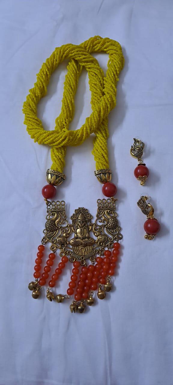 Exclusive multi layered  yellow glass seed beads necklace set with golden  oxidised pendant n earrings