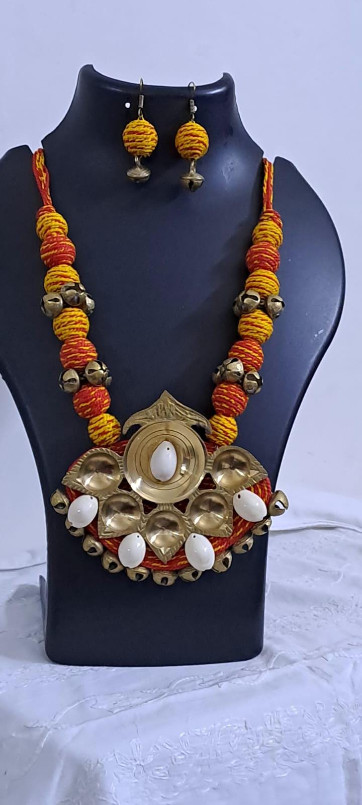 Red yellow thread beads necklace set with dokra pendant n matching earrings