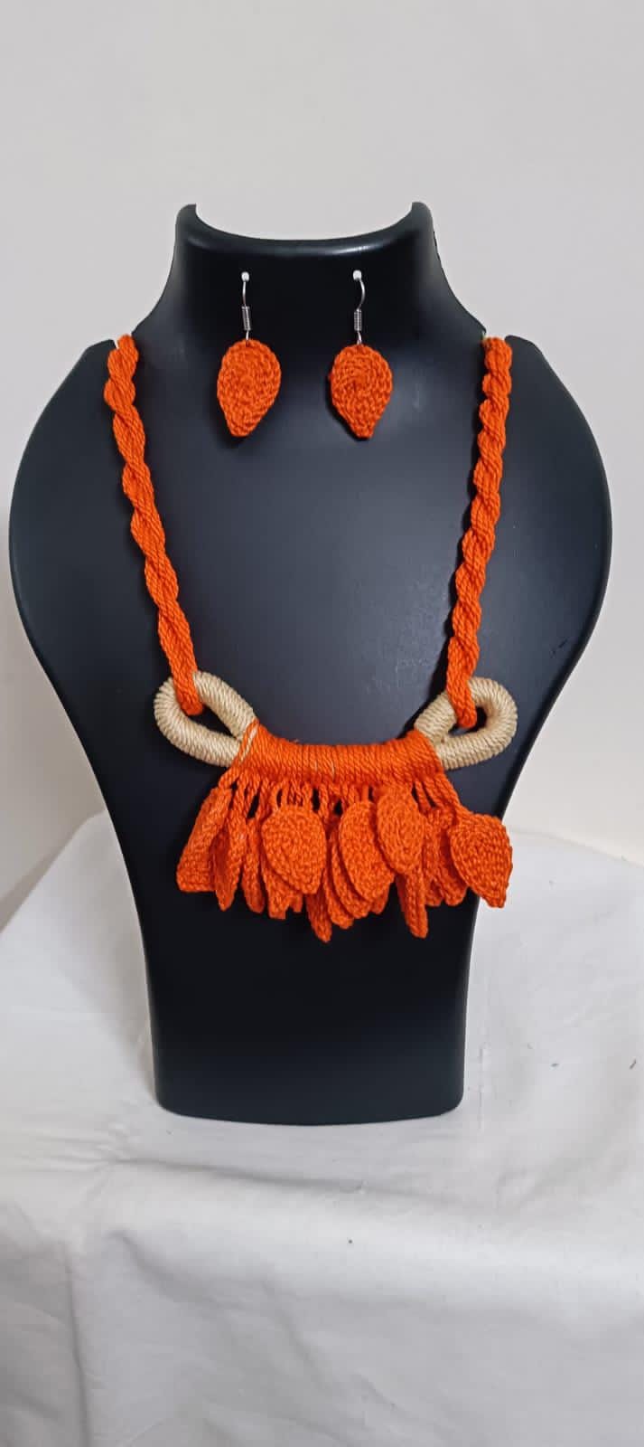 Orange Crochet thread necklace set with leaf fringes and matching earrings