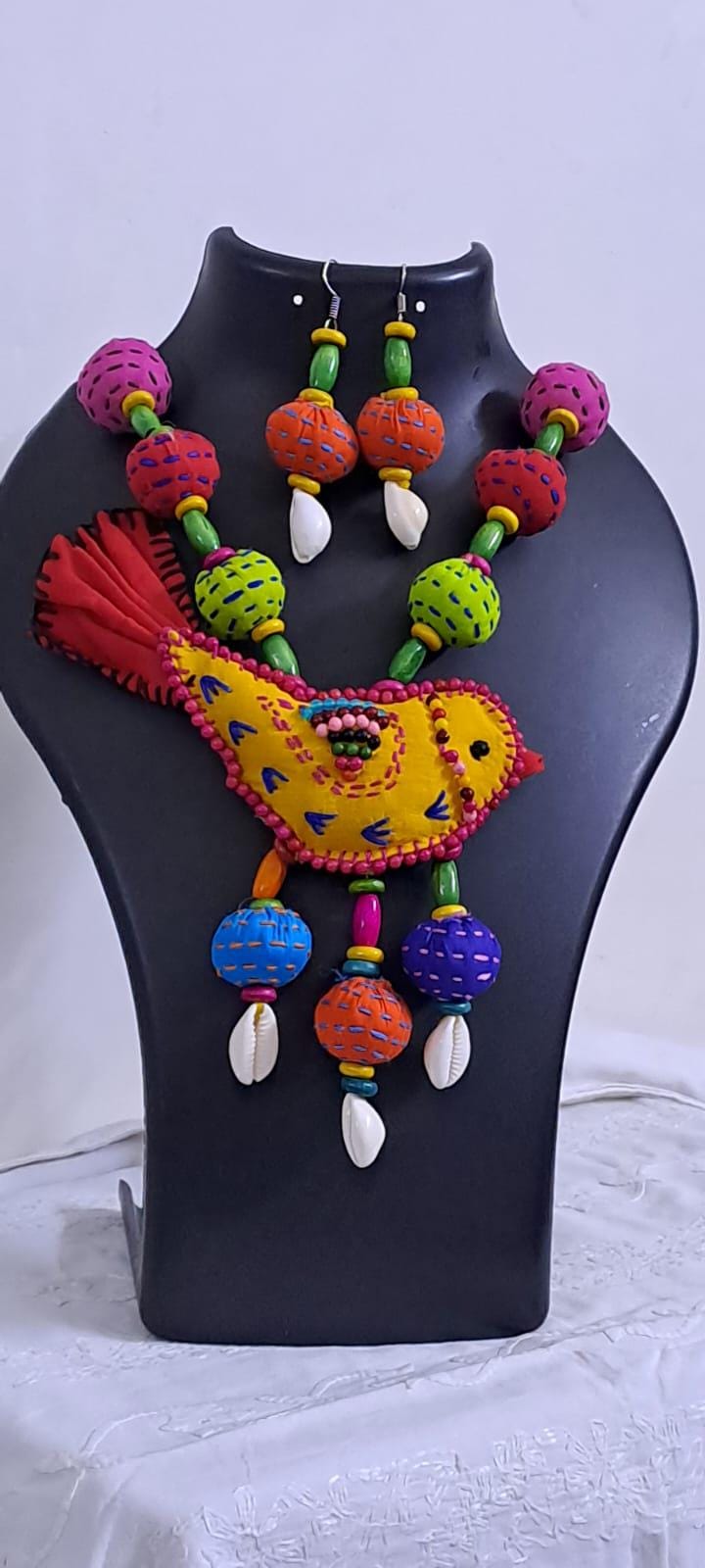 Exclusive fabric necklace with embroidered yellow fabric bird pendant and fabric beads n matching beads