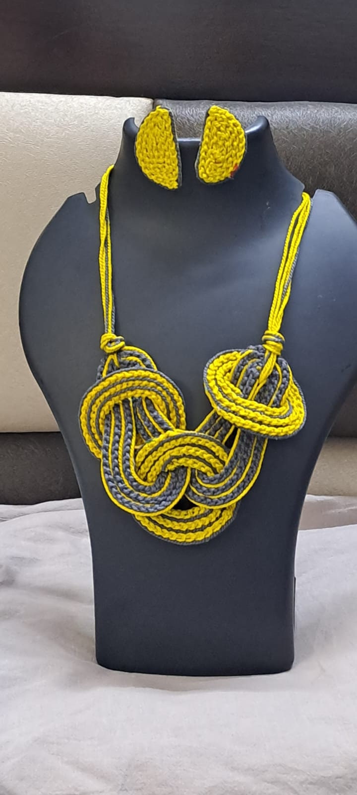 Celtic knot thread necklace with matching thread earrings.
