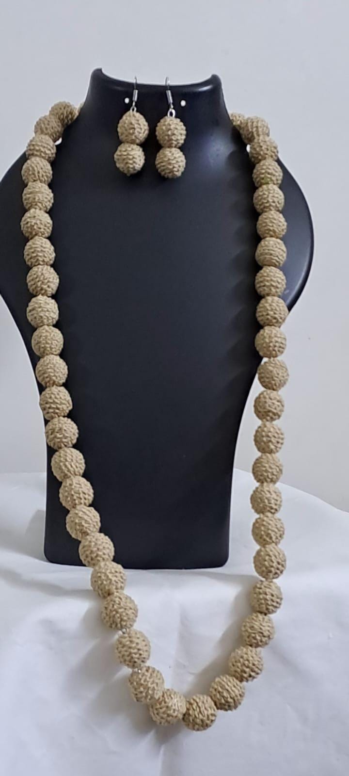 Exclusive beige colour thread beads long necklace set with matching earrings