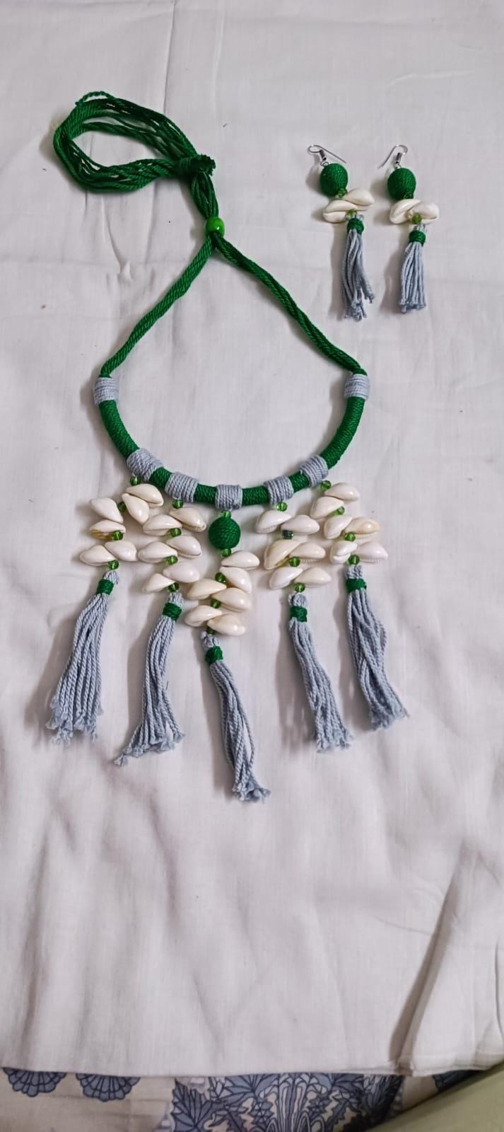 Exclusive green n grey hasuli thread necklace set with shell fringes n matching earrings