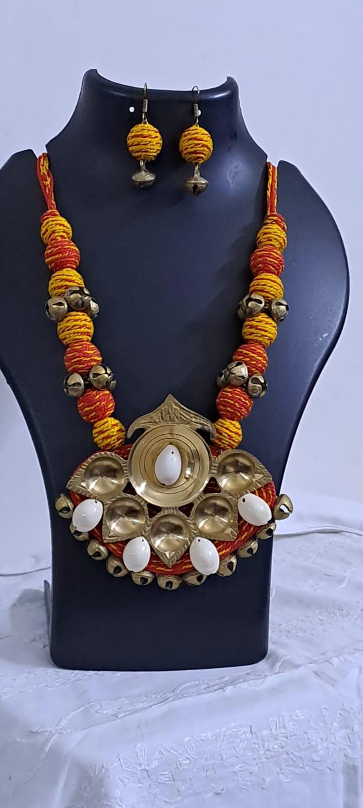 Red yellow thread beads necklace set with dokra pendant n matching earrings