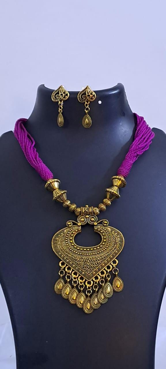 Purple thread necklace with Golden oxidised traditional pendant