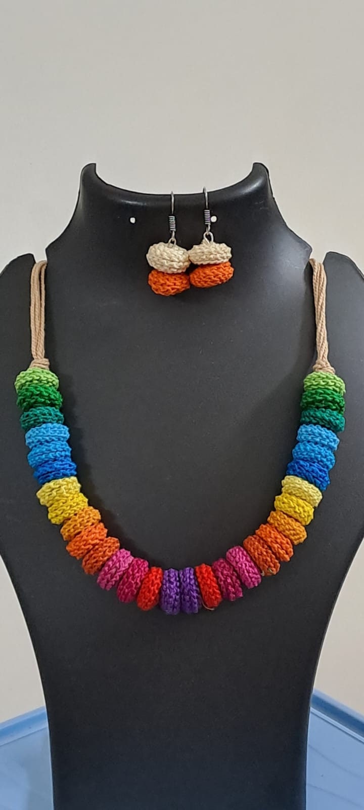 Exclusive multi coloured crochet necklace with colouful matching earrings.