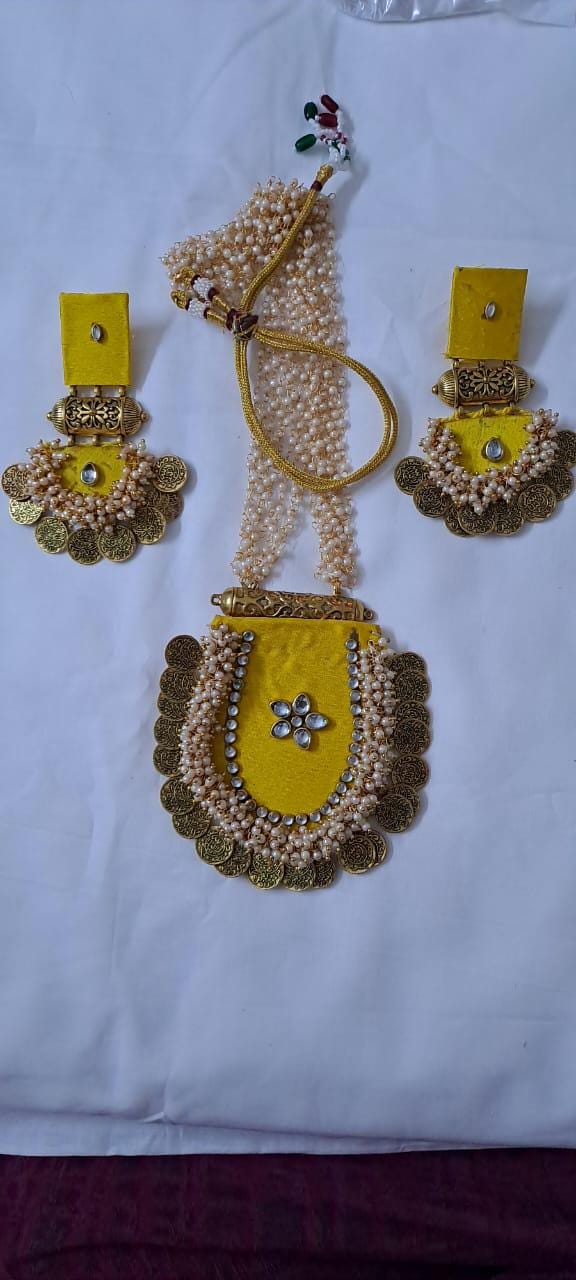 Exclusive Indian traditional yellow fabric necklace with laural beads and kundan n matching earrings