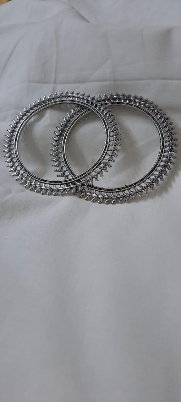 Traditional silver oxidised bangles with birds border.
