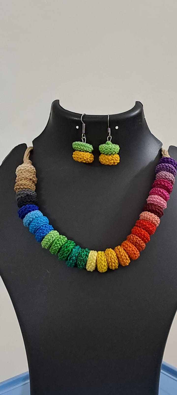 Exclusive multi coloured crochet necklace with colouful matching earrings.
