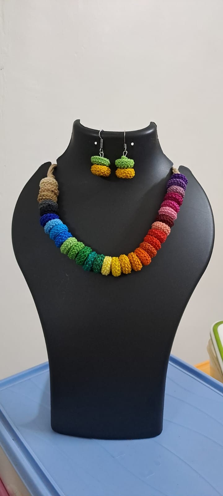Exclusive multi coloured crochet necklace with colouful matching earrings.