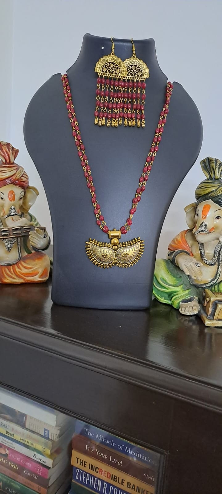 Red beads necklace with golden oxidised pendant
