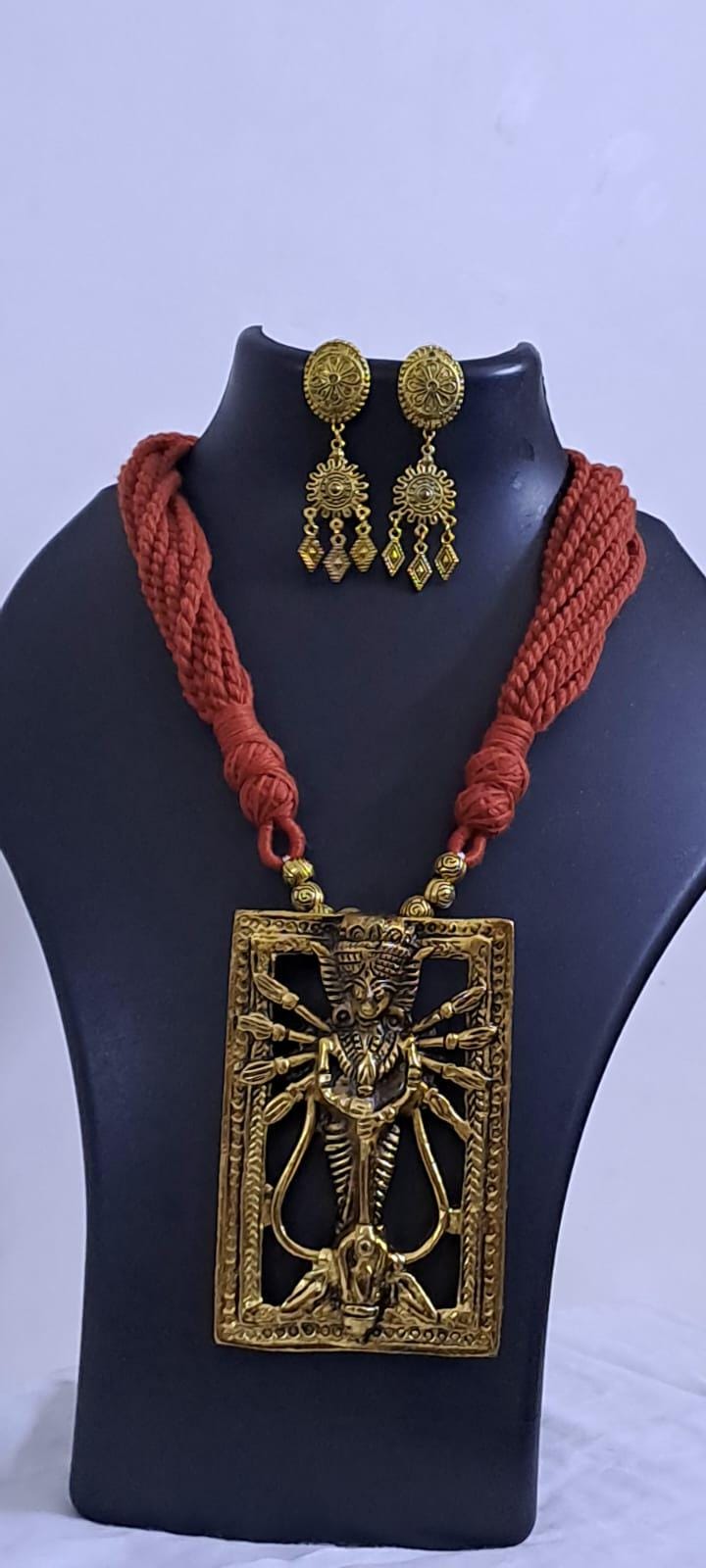 Brown  thread necklace with oxidised golden durga pendant