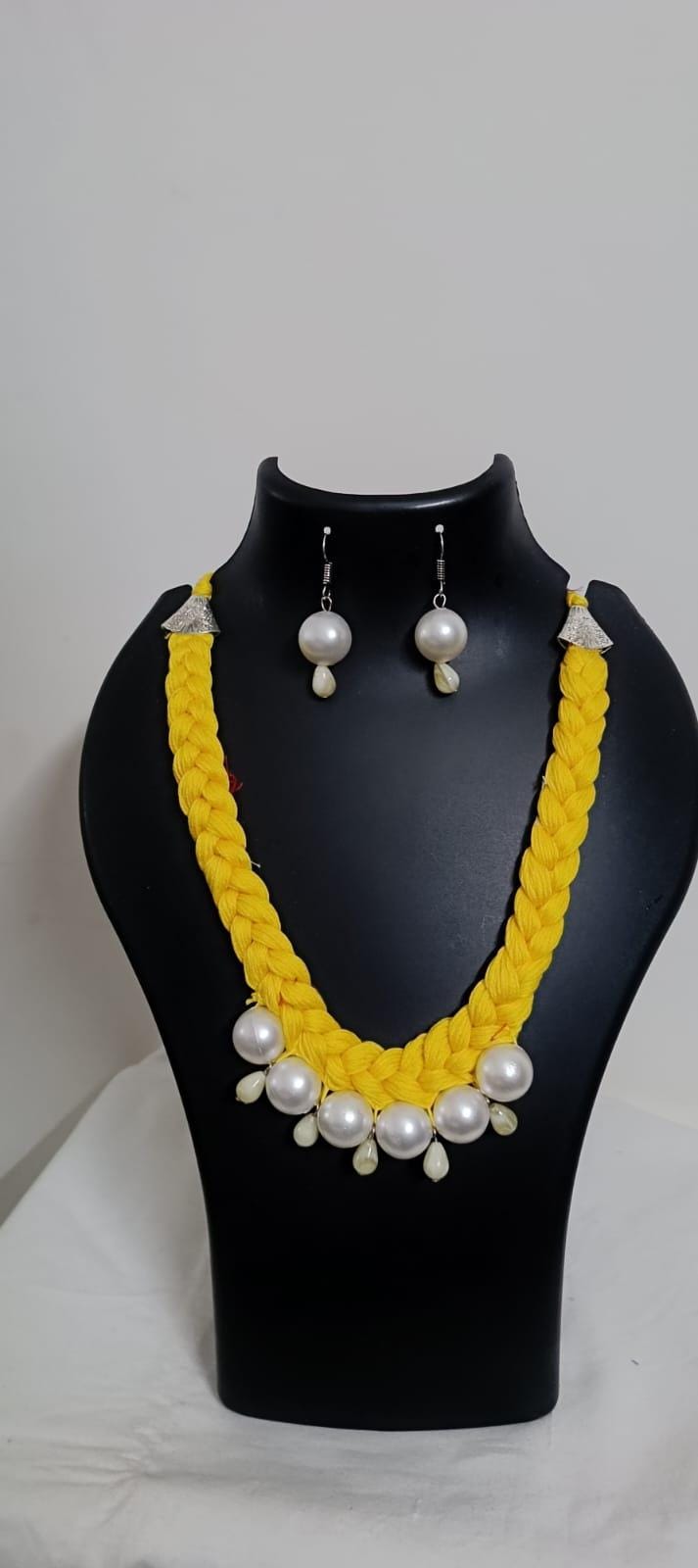 Yellow  braided thread necklace with pearl n pearl danglers