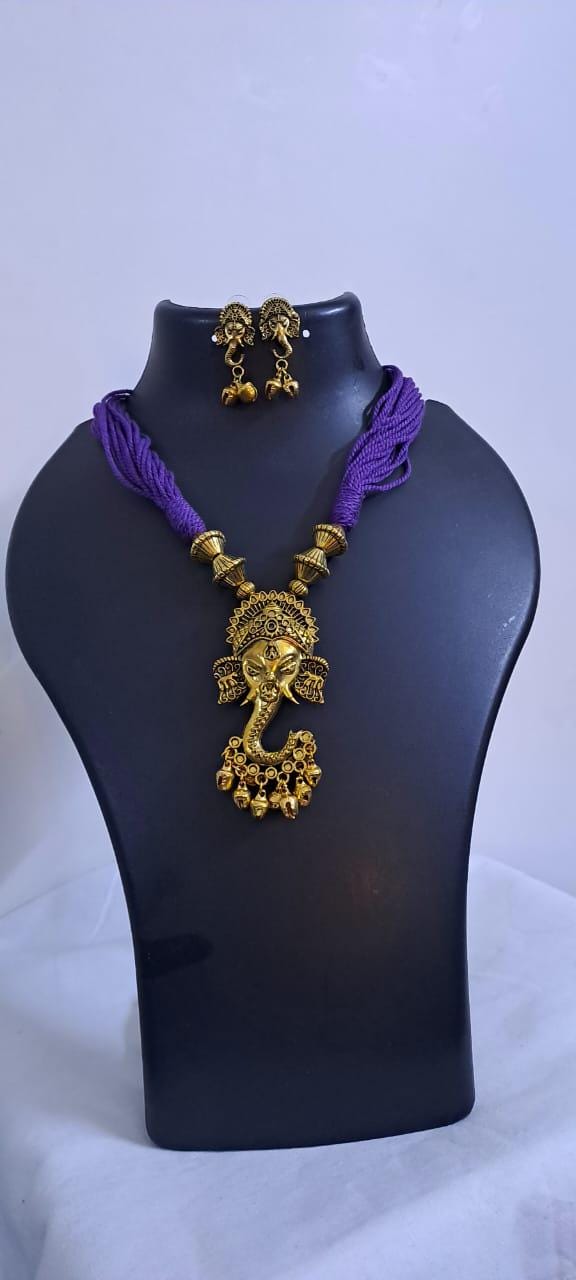 Purple thread necklace with Golden oxidised traditional pendant