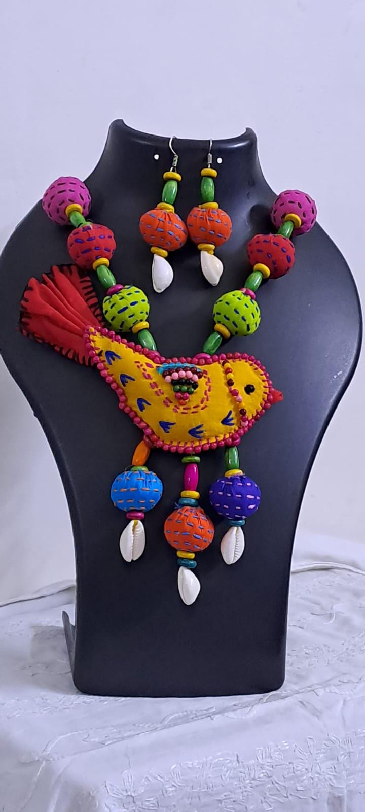 Exclusive fabric necklace with embroidered yellow fabric bird pendant and fabric beads n matching beads
