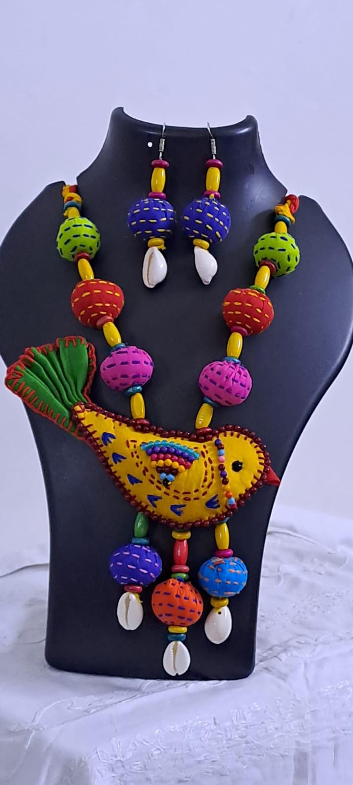Exclusive fabric necklace with embroidered yellow fabric bird pendant and fabric beads n matching beads