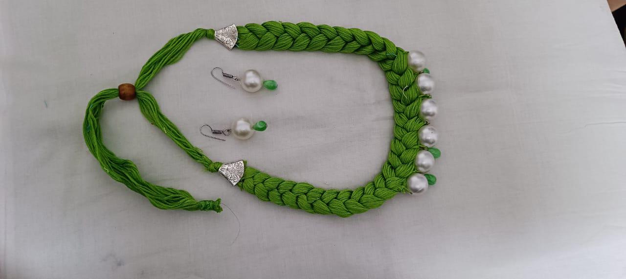 Green  braided thread necklace with pearl n pearl danglers