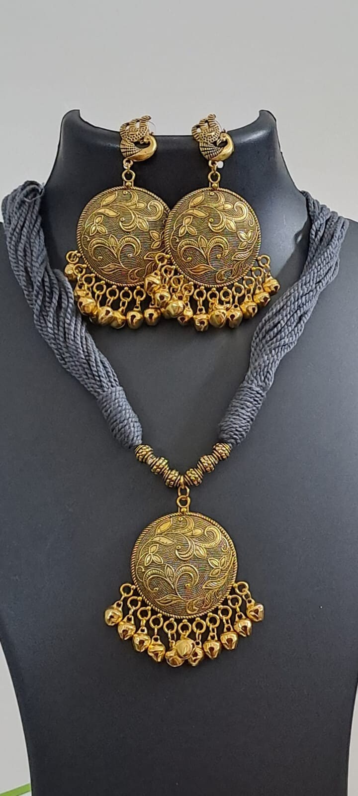 Grey thread necklace with Golden oxidised traditional pendant