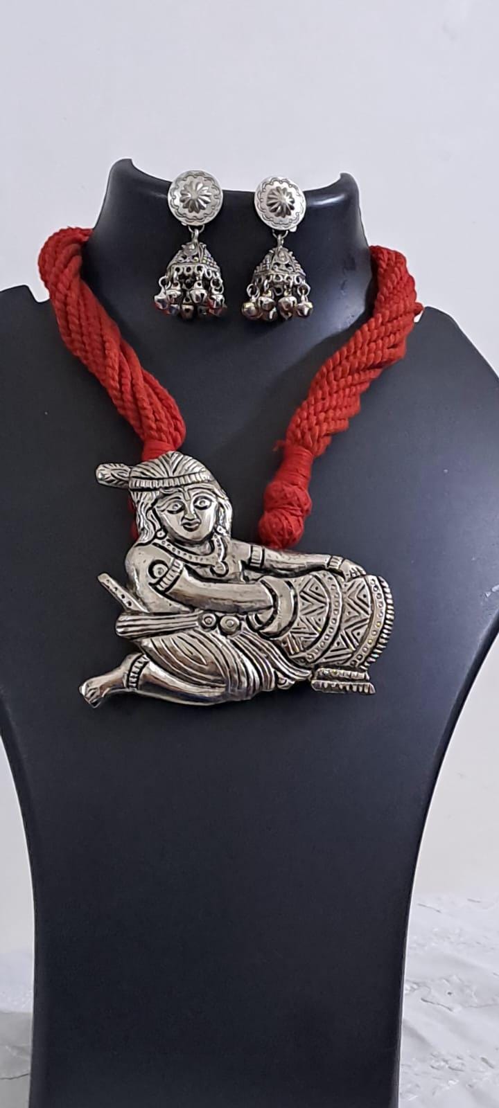 Red thread necklace with silver oxidised krishna pendant