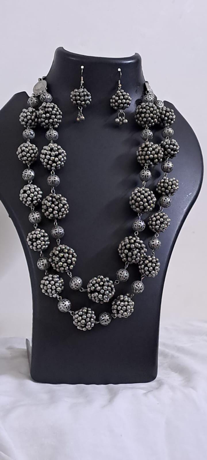 Exclusive silver oxidised long chain set with matching earrings