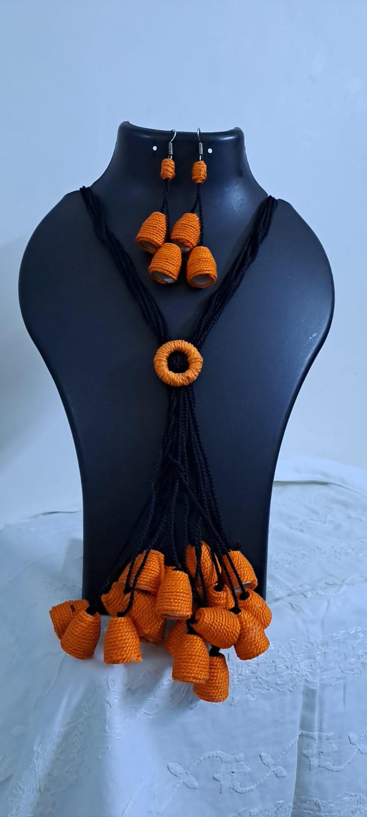 Orange thread necklace with multiple thread aparajita flower fringes n matching earrings