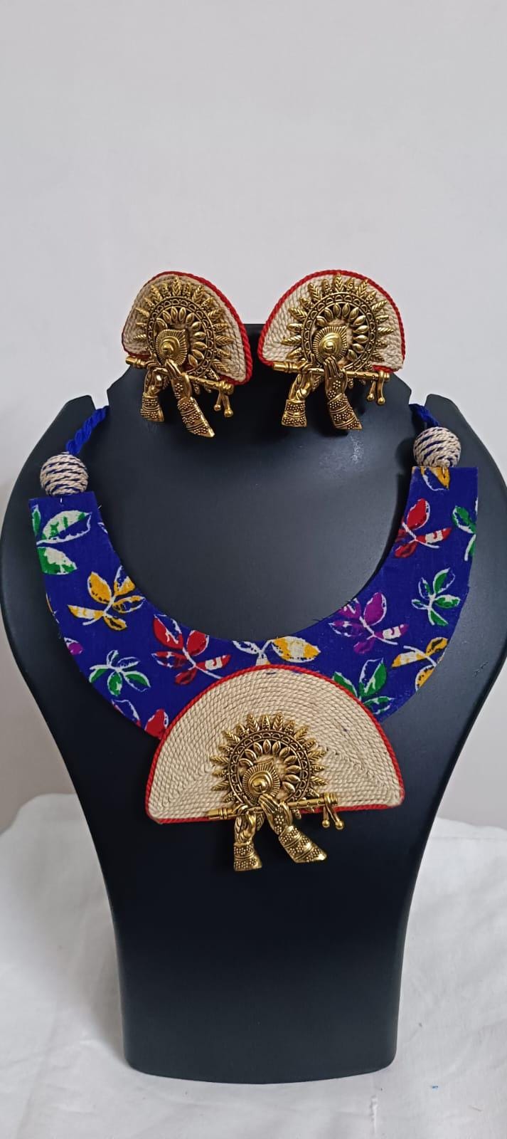 Unique fabric n thread necklace set with golden oxidised pendant and matching earrings