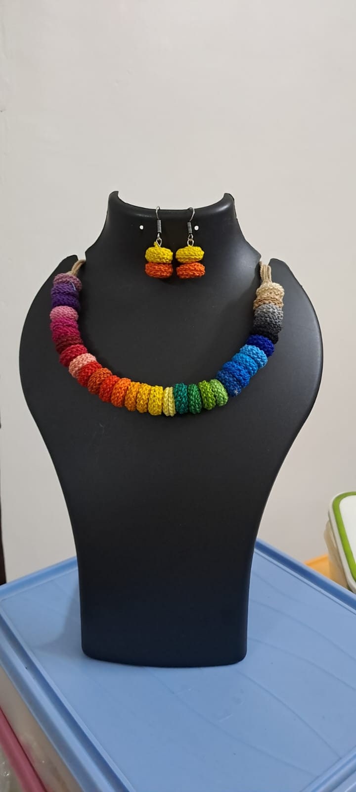Exclusive multi coloured crochet necklace with colouful matching earrings.