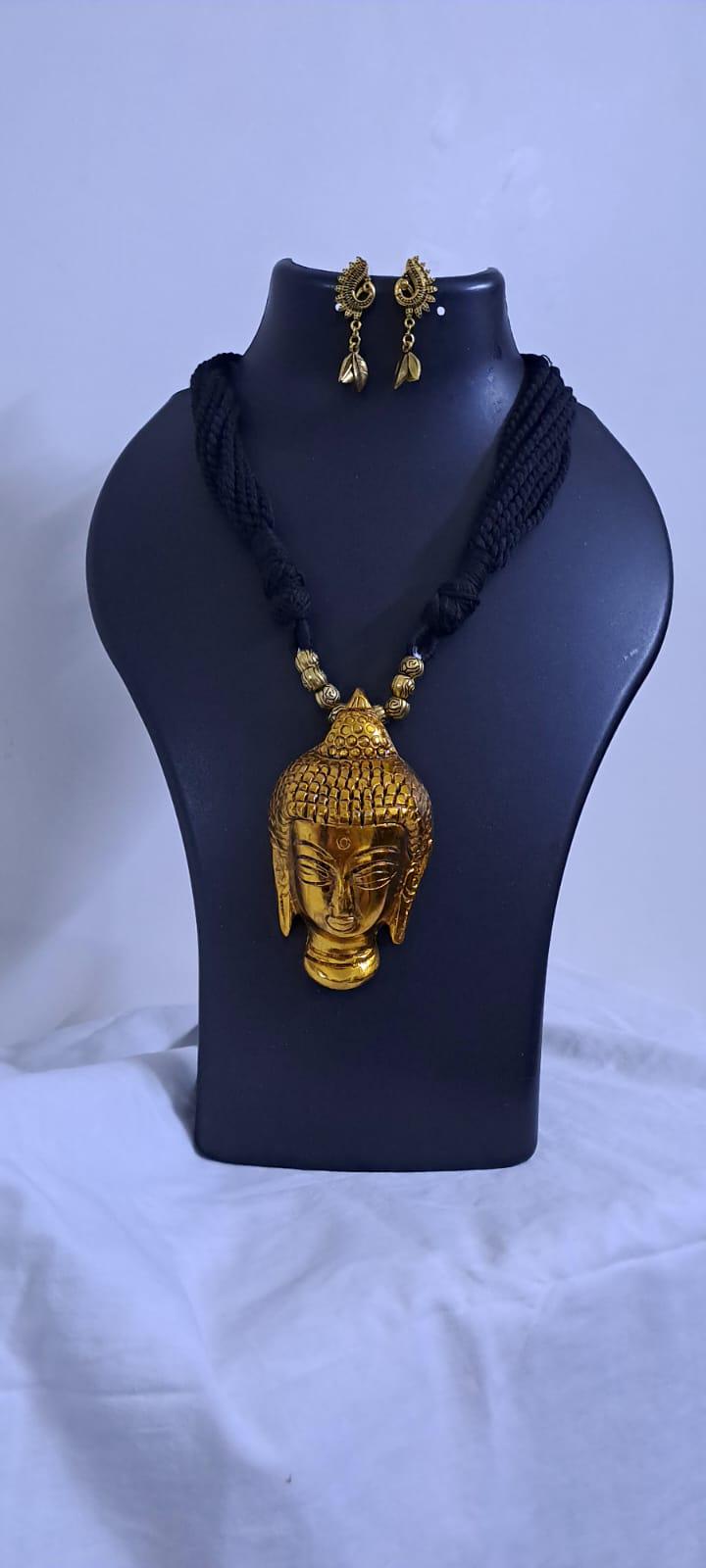 Black thread necklace with oxidised golden buddha pendant