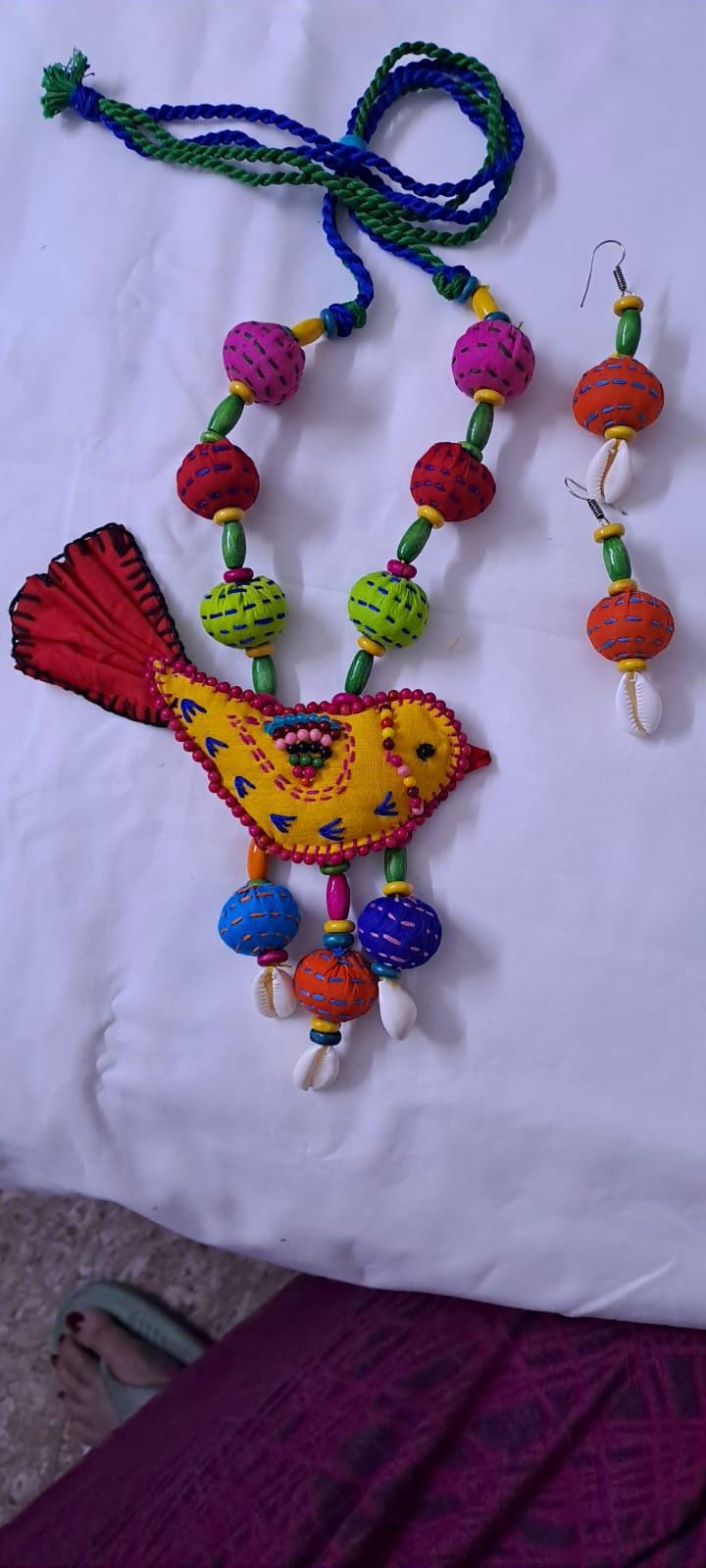 Exclusive fabric necklace with embroidered yellow fabric bird pendant and fabric beads n matching beads