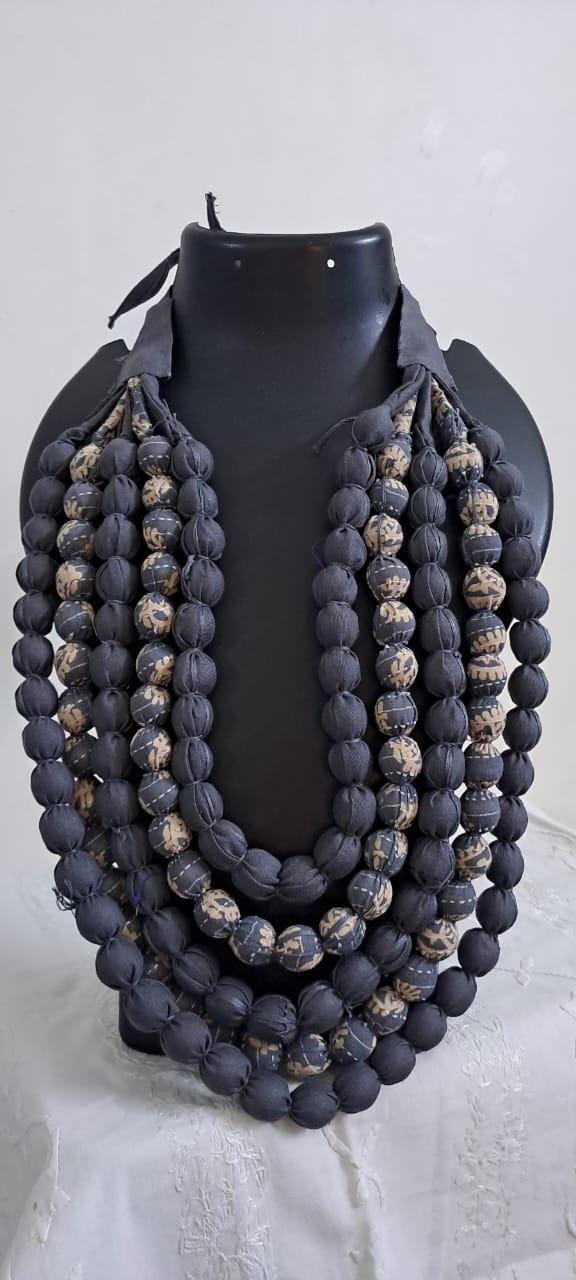 Exclusive multi-layered light grey fabric necklace
