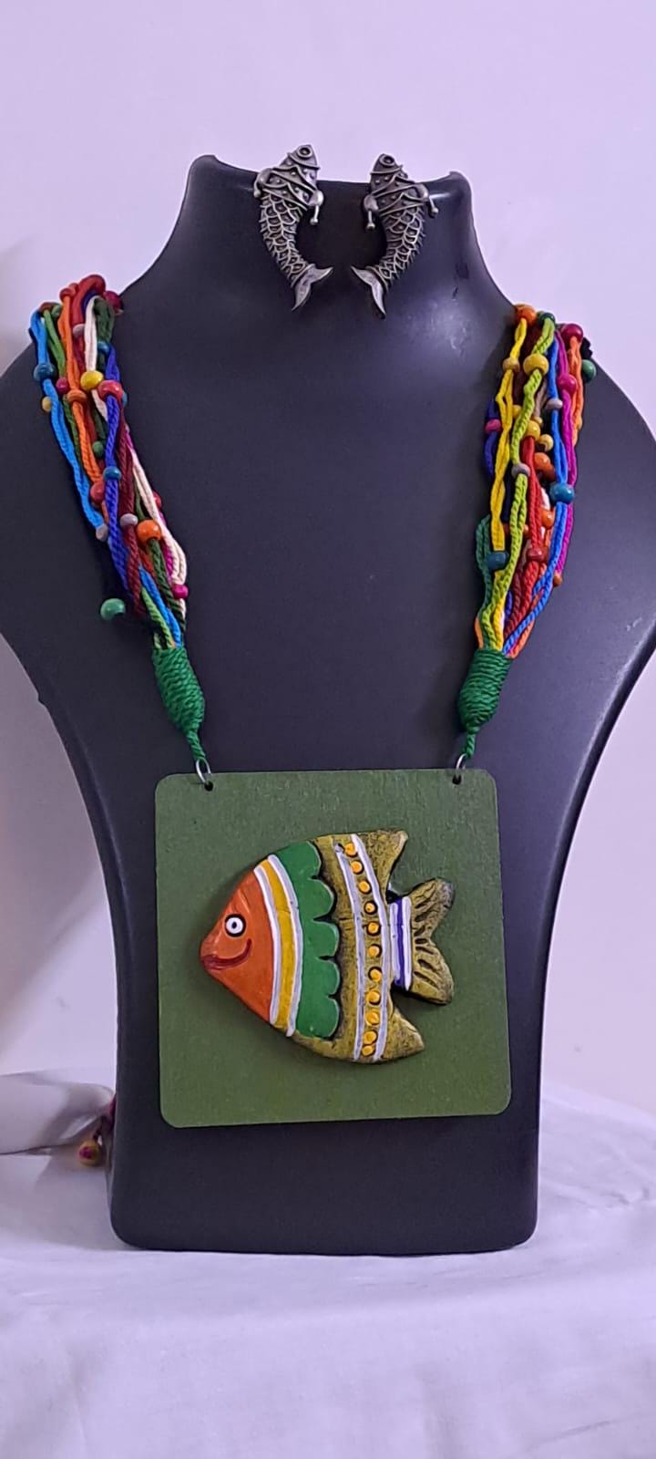 Terracotta fish pendant and thread necklace