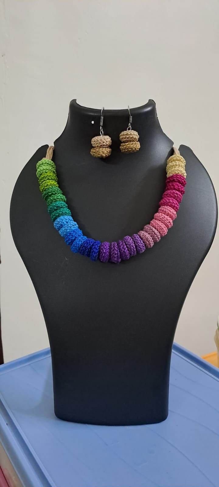 Exclusive multi coloured crochet necklace with colouful matching earrings.