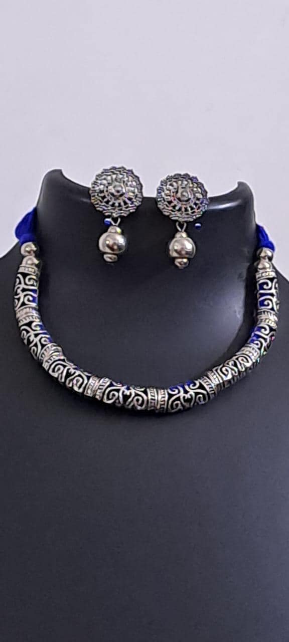 Exclusive silver oxidised hasuli set with matching earrings