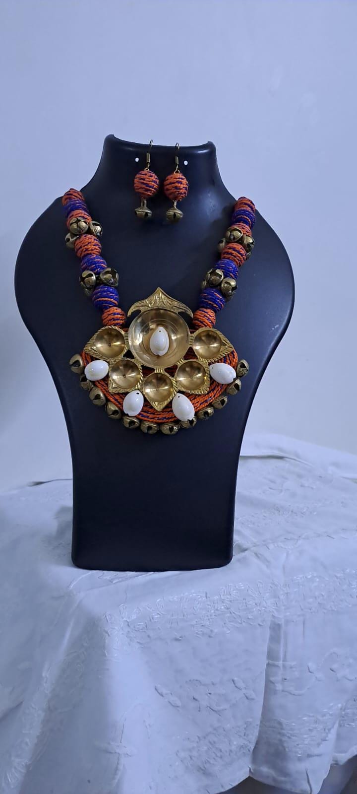 Blue Orange thread beads necklace set with dokra pendant n matching earrings